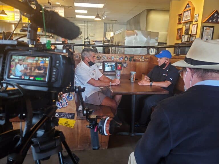 SignalSPS veteran media team filming on location using professional video production equipment.