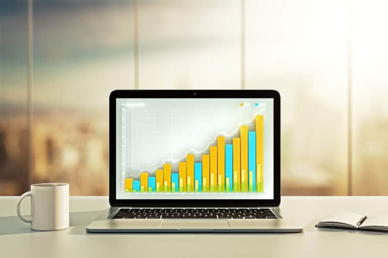 High-growth business graph on a laptop screen representing successful marketing strategies in Frederick, Maryland.